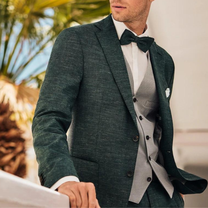 Image of man wearing a suit and bowtie