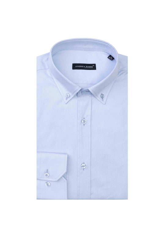 A long-sleeved buttoned shirt in blue color with a button-down collar, displayed against a white background.