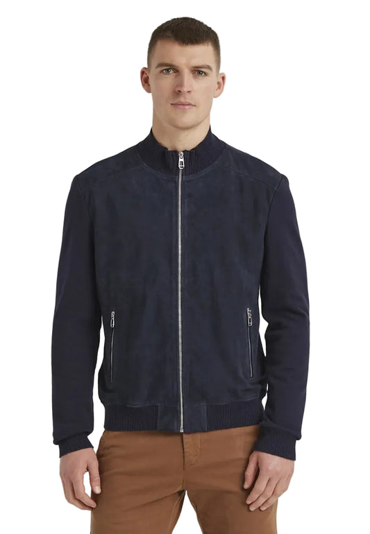 Man wearing a navy blue jacket with a white background